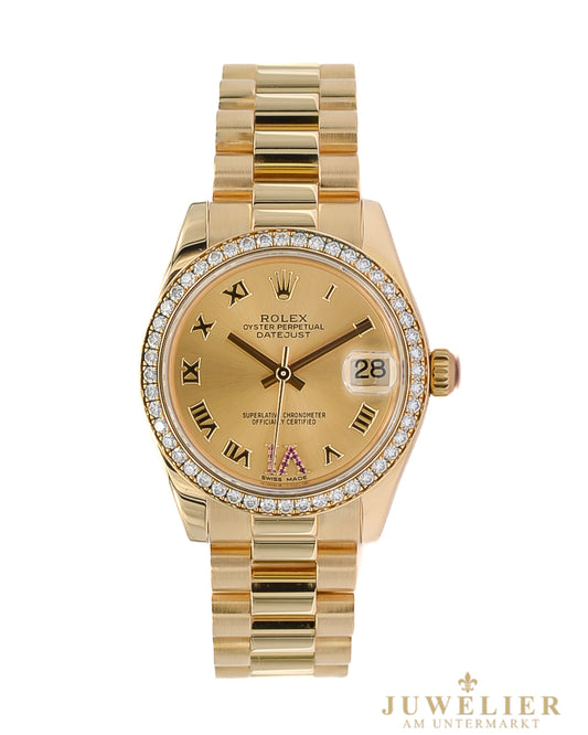Rolex Datejust 31 I Diamond Bezel I Ruby I Yellowgold 18kt. I LC 100 I Box & Papers