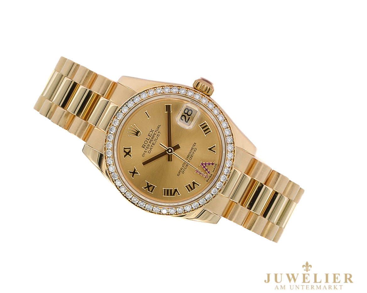 Rolex Datejust 31 I Diamond Bezel I Ruby I Yellowgold 18kt. I LC 100 I Box & Papers