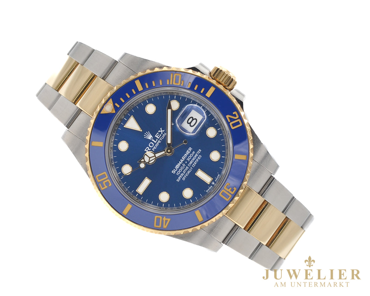 Rolex submariner Date I Bluesy I Box & Papers I Steel / Gold 18kt. I 2021