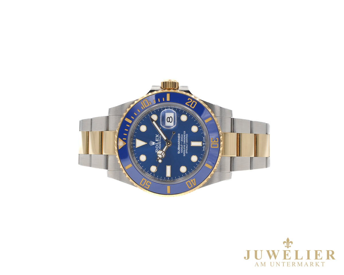 Rolex submariner Date I Bluesy I Box & Papers I Steel / Gold 18kt. I 2021
