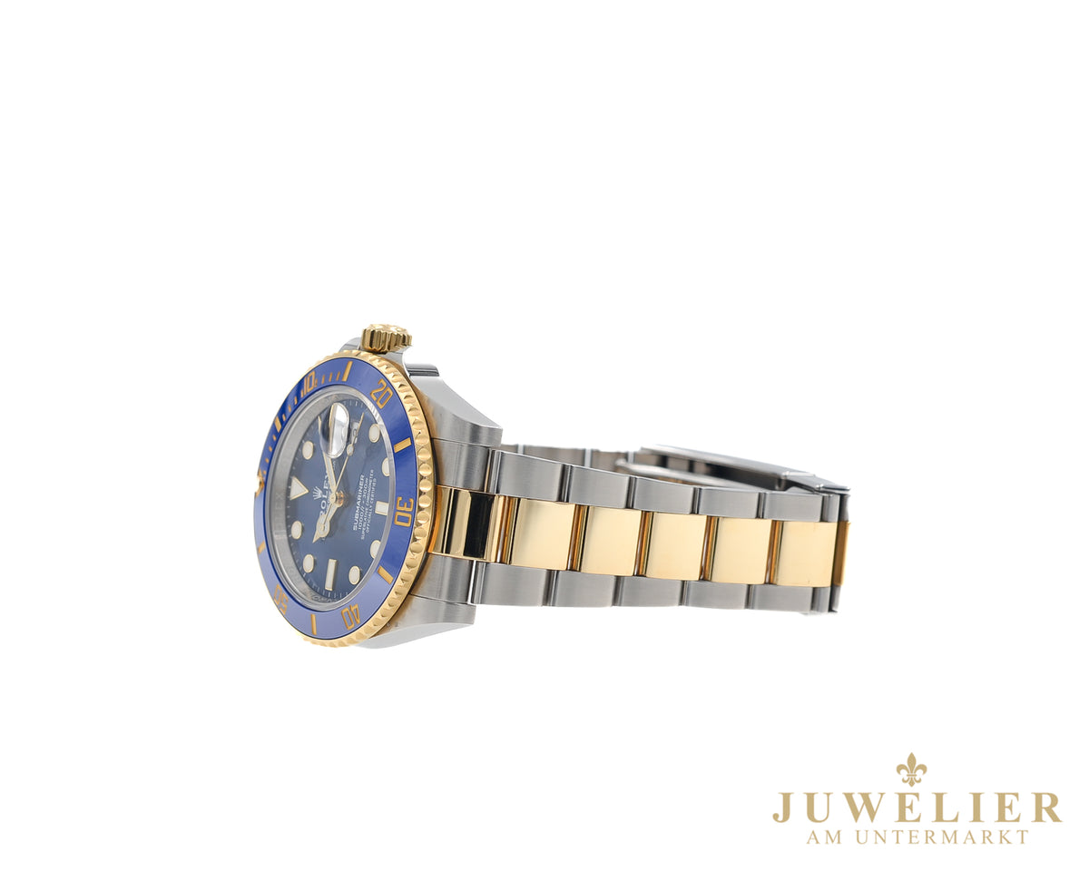 Rolex submariner Date I Bluesy I Box & Papers I Steel / Gold 18kt. I 2021