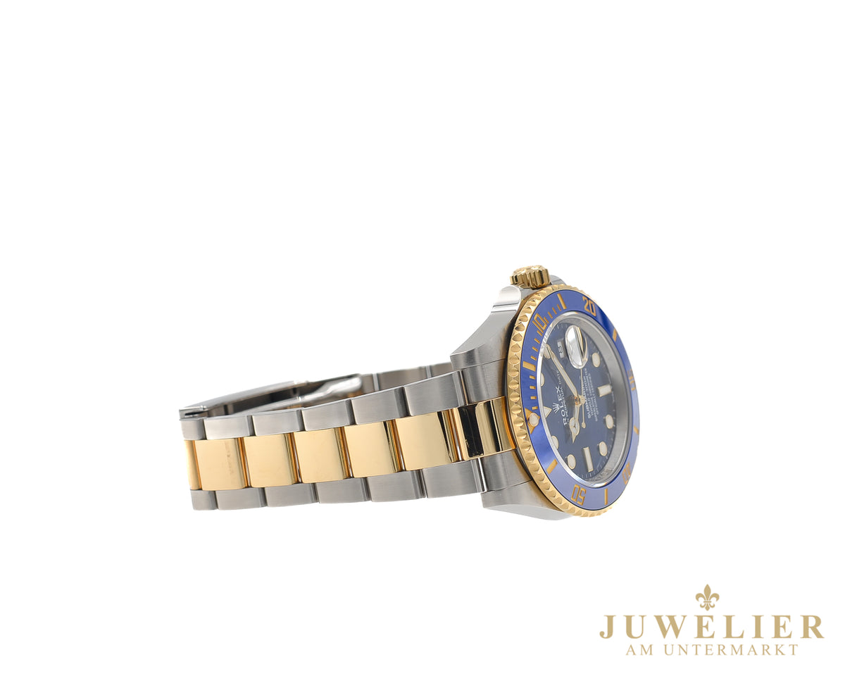 Rolex submariner Date I Bluesy I Box & Papers I Steel / Gold 18kt. I 2021