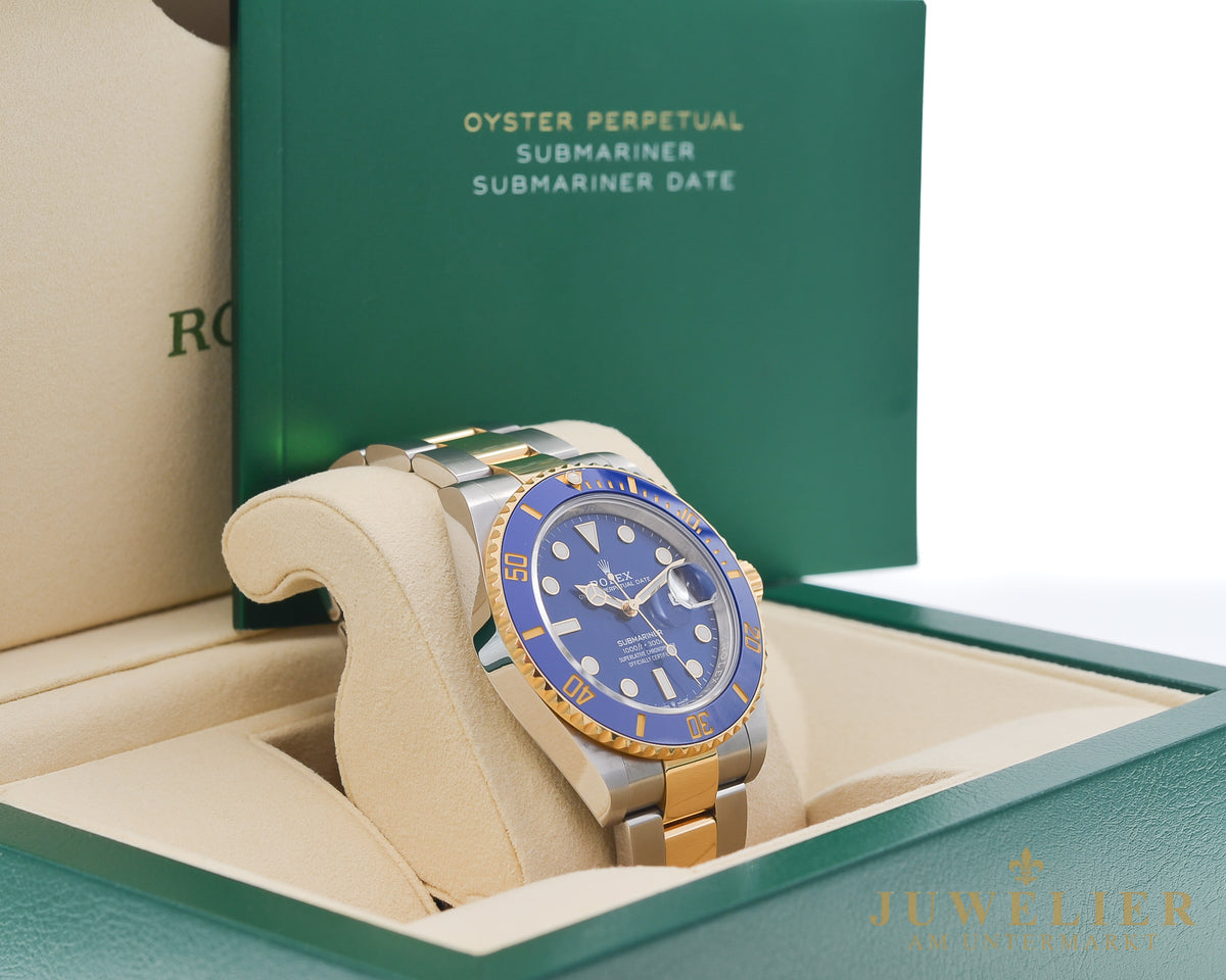 Rolex submariner Date I Bluesy I Box & Papers I Steel / Gold 18kt. I 2021