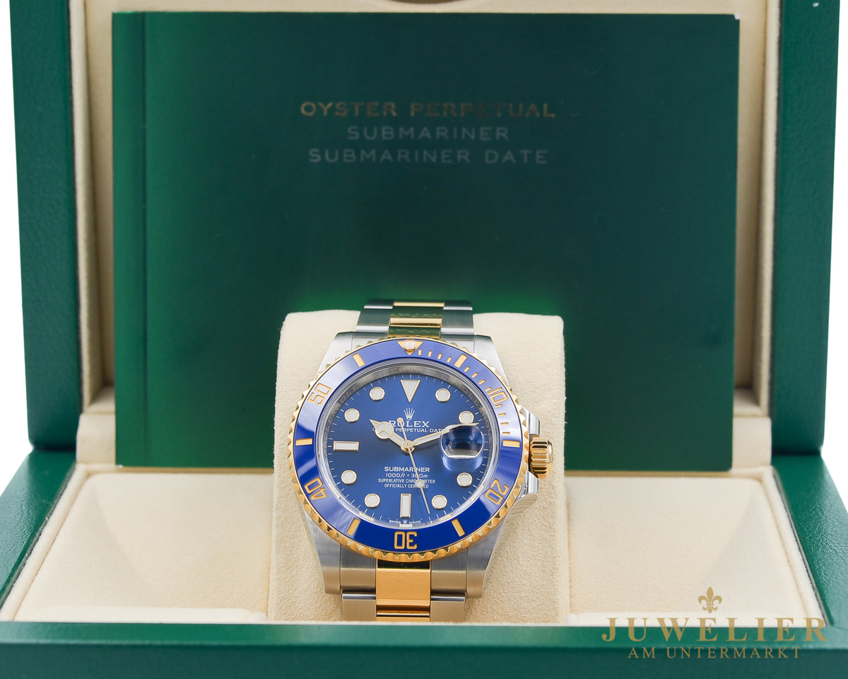 Rolex submariner Date I Bluesy I Box & Papers I Steel / Gold 18kt. I 2021